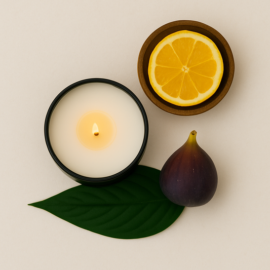 Minimalist black jar soy wax candle labeled Nocturne Fleur, surrounded by dried rose petals and fig slices; elegant skin-safe aromatherapy candle